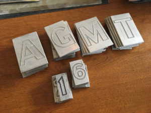 Delano Granite aluminum letters.