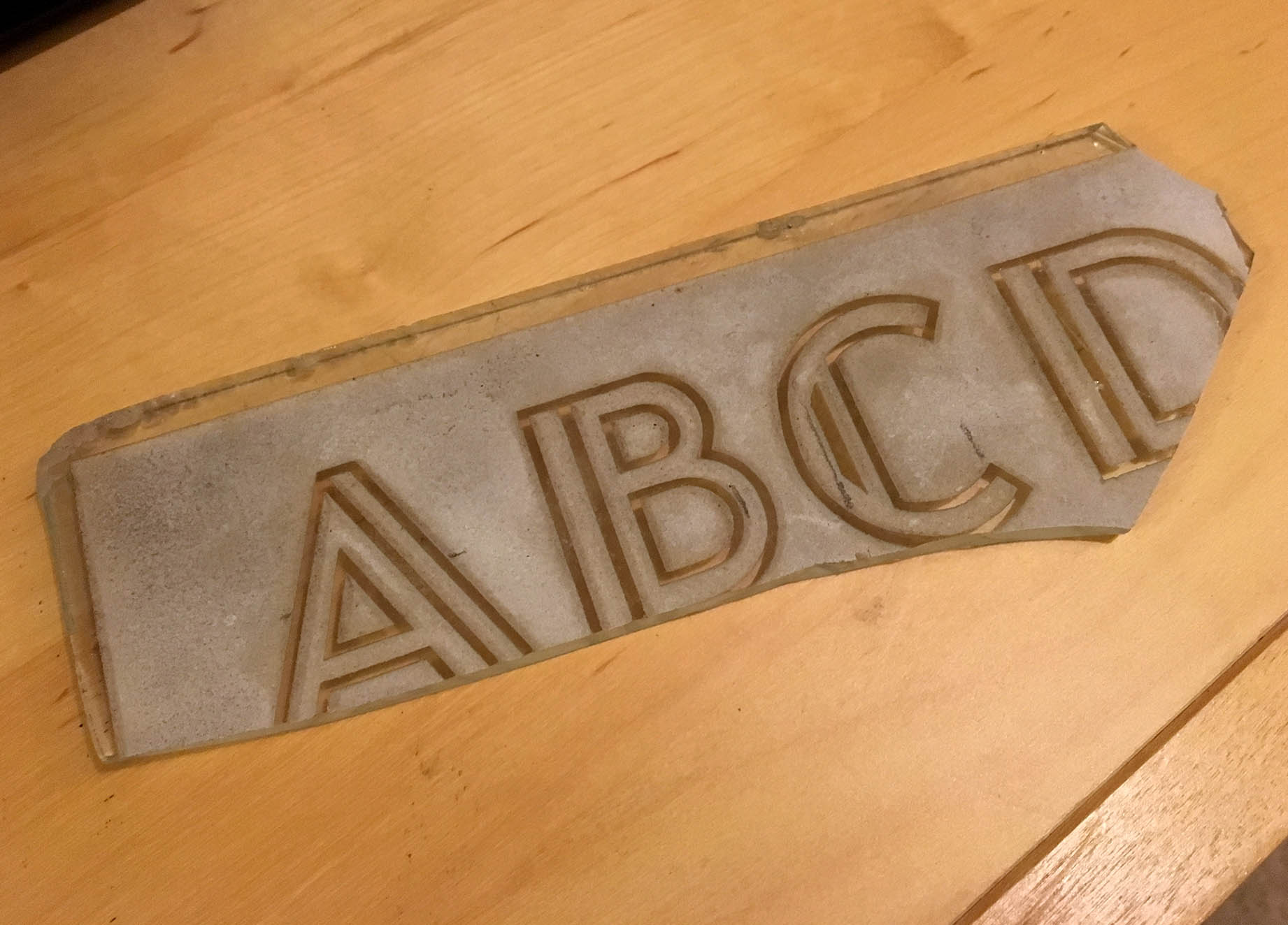 DGW_ModernInline_BrokenGlassPlate Delano Granite Works broken glass Modern alphabet.